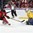 BUFFALO, NEW YORK - JANUARY 5: Sweden's Filip Gustavsson #30 makes the save on Canada's Dillon Dube #9 while Linus Hogberg #6 defends during gold medal game action at the 2018 IIHF World Junior Championship. (Photo by Matt Zambonin/HHOF-IIHF Images)

